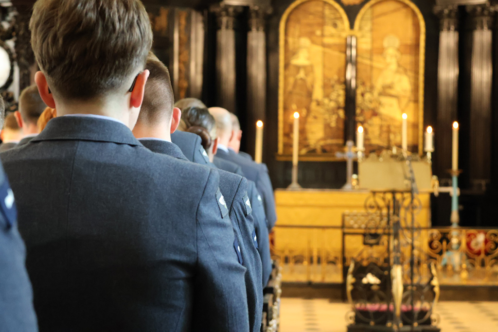 A view over the shulders of the congregation toward the altar.